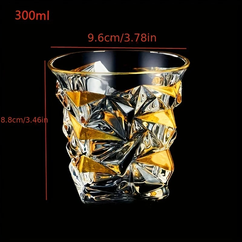 Golden painted crystal tumblers from MC THE BLACK DIAMOND, multi-functional glassware with elegant design in a clear, reflective finish.