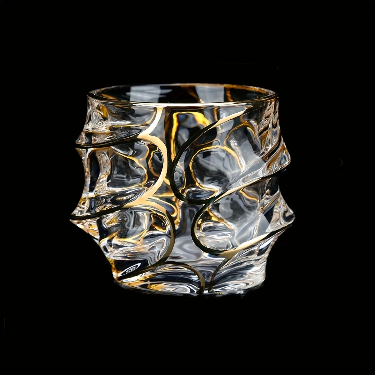 Golden painted crystal tumbler from MC THE BLACK DIAMOND, multi-functional glassware with elegant design for drinks and serving.