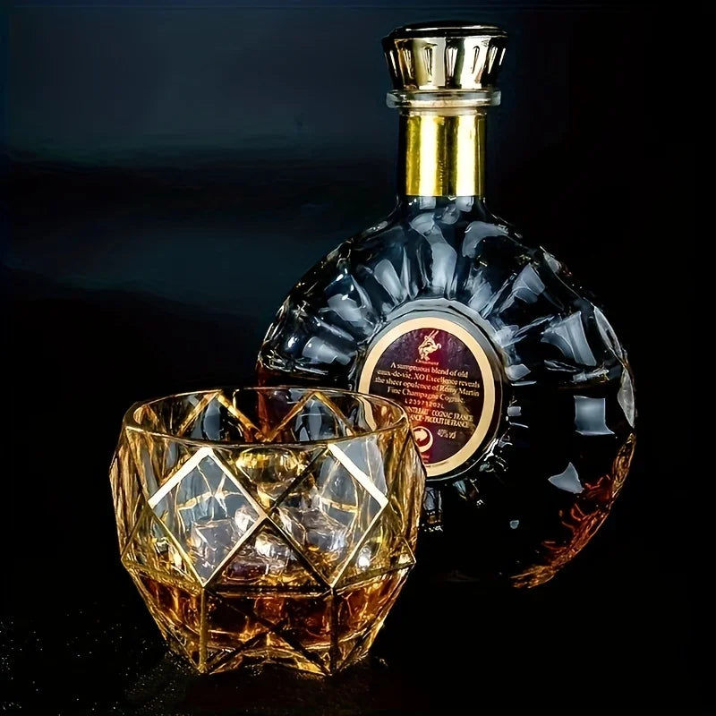 Golden painted crystal tumblers from MC THE BLACK DIAMOND, multi-functional drinkware with elegant crystal design and gold accents.