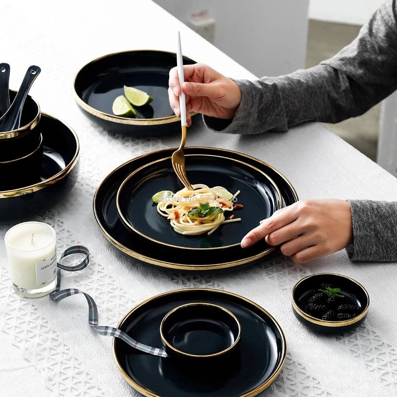 Pink black and gold inlay ceramic dinnerware set by MC THE BLACK DIAMOND, featuring elegant plates and bowls for stylish dining.