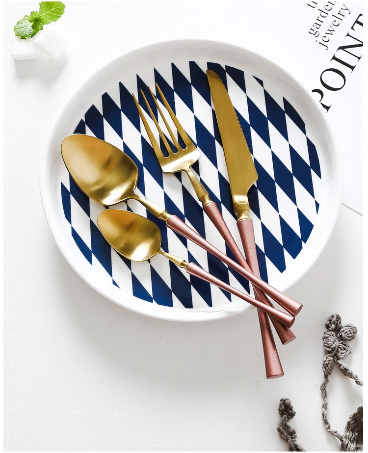 Matte stainless steel dinnerware set with black, gold, and silver finishes from 𝕄𝕔 𝕋𝕙𝕖 𝔹𝕝𝕒𝕔𝕜 𝔻𝕚𝕒�