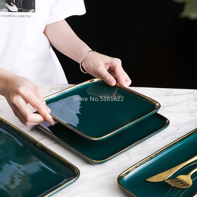 Green ceramic dinnerware set with gold inlay, includes dessert plates, bowls, and salad dishes from 𝕄𝕔 𝕋𝕙𝕖 𝔹𝕝𝕒𝕔𝕜 𝔻𝕚