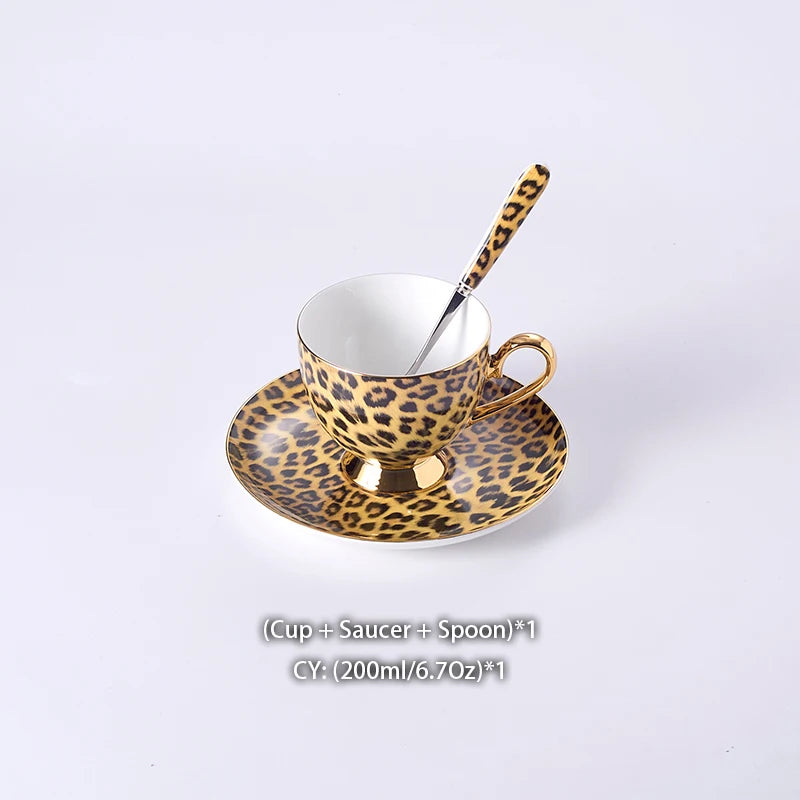 Leopard print bone china coffee set with teapot, cups, sugar bowl, and creamer from 𝕄𝕔 𝕋𝕙𝕖 𝔹𝕝𝕒𝕔𝕜 𝔻𝕚