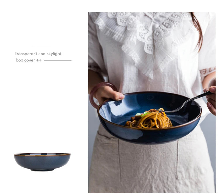 Deep blue ceramic dinnerware set by MC THE BLACK DIAMOND, featuring plates and bowls for elegant table setting.