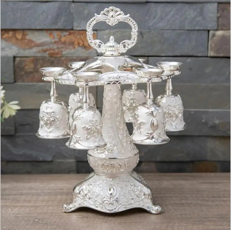 Set of gold and silver decoration cups from MC THE BLACK DIAMOND, elegant drinkware set with ornate metallic finish.