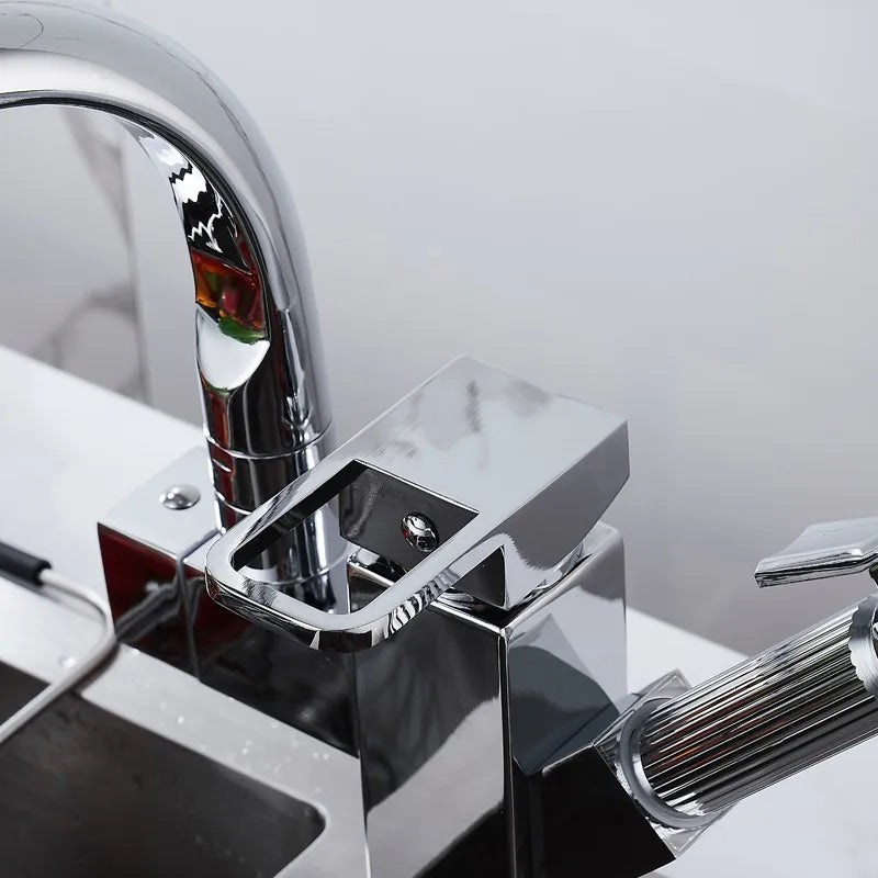 Chrome silver kitchen sink faucet with spring spout, designed for hot and cold water by MC THE BLACK DIAMOND.