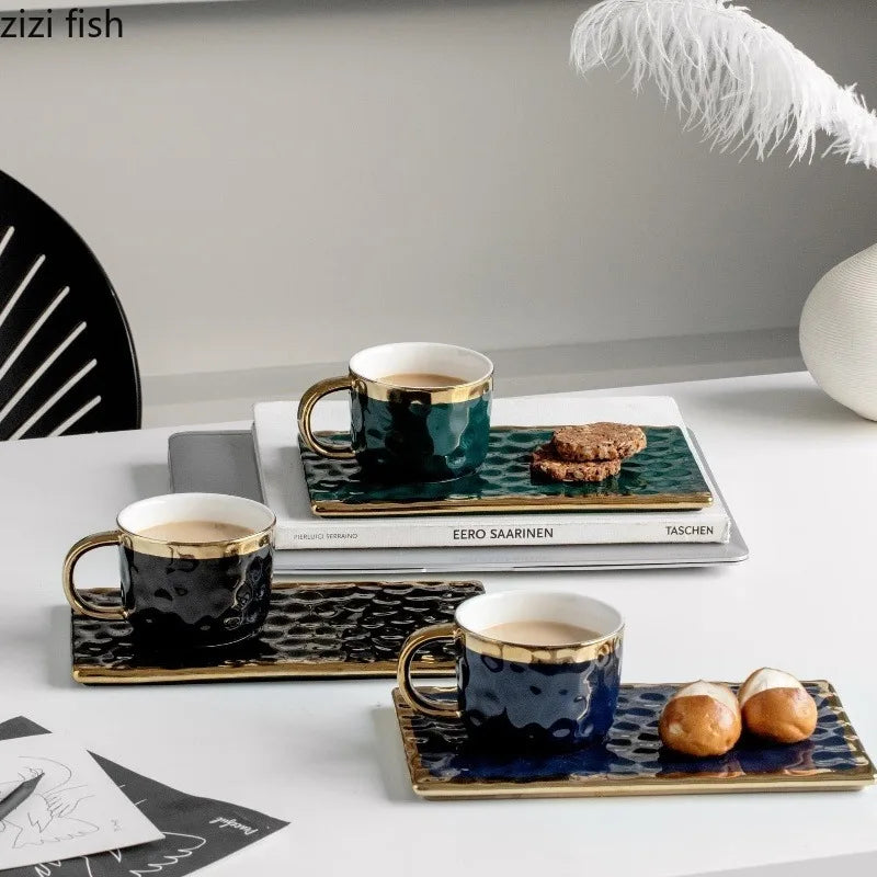 Set of MC THE BLACK DIAMOND coffee and tea cups, milk mugs and afternoon tea cups arranged for a cozy beverage setup.