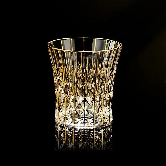 Elegant glass gold crystal red cup from MC THE BLACK DIAMOND, part of a stylish drinkware set with a luxurious design.