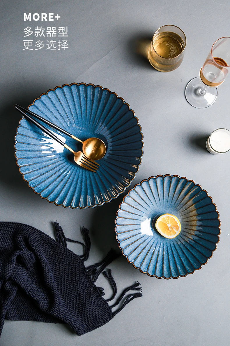 Western dinnerware set by MC THE BLACK DIAMOND featuring kiln-variable glazed ceramic plates and bowls arranged on a table.