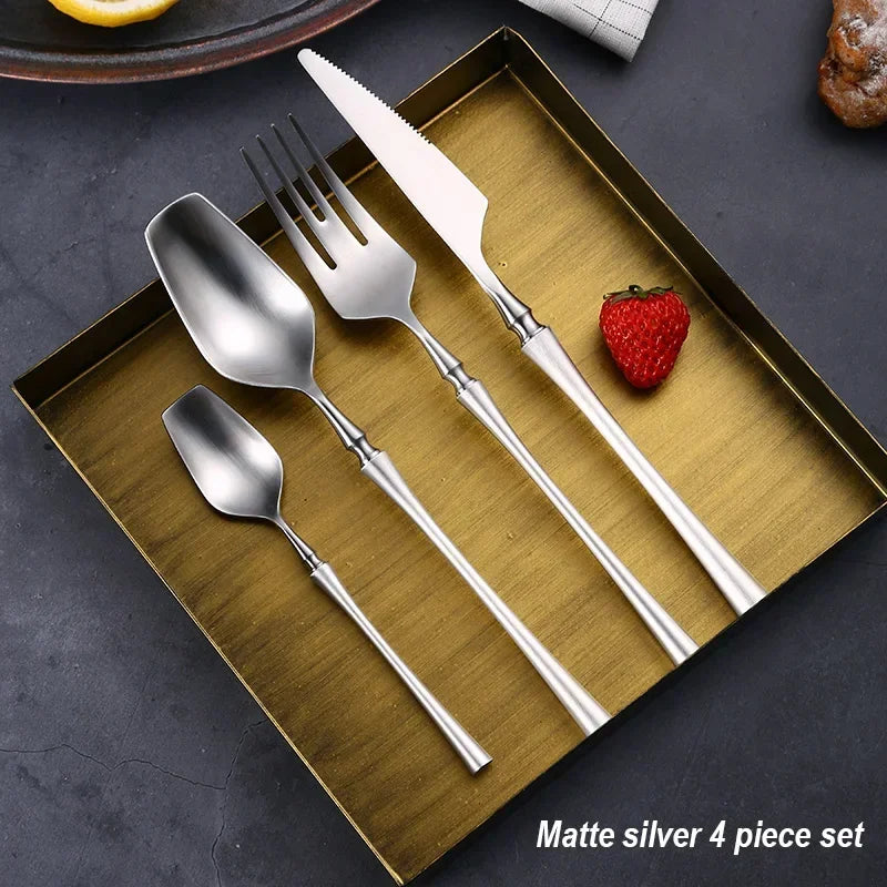 Mirror matte stainless steel dinnerware set featuring black, gold, and silver finishes from 𝕄𝕔 𝕋𝕙𝕖 𝔹𝕝𝕒𝕔𝕜 𝔻𝕚𝕒�