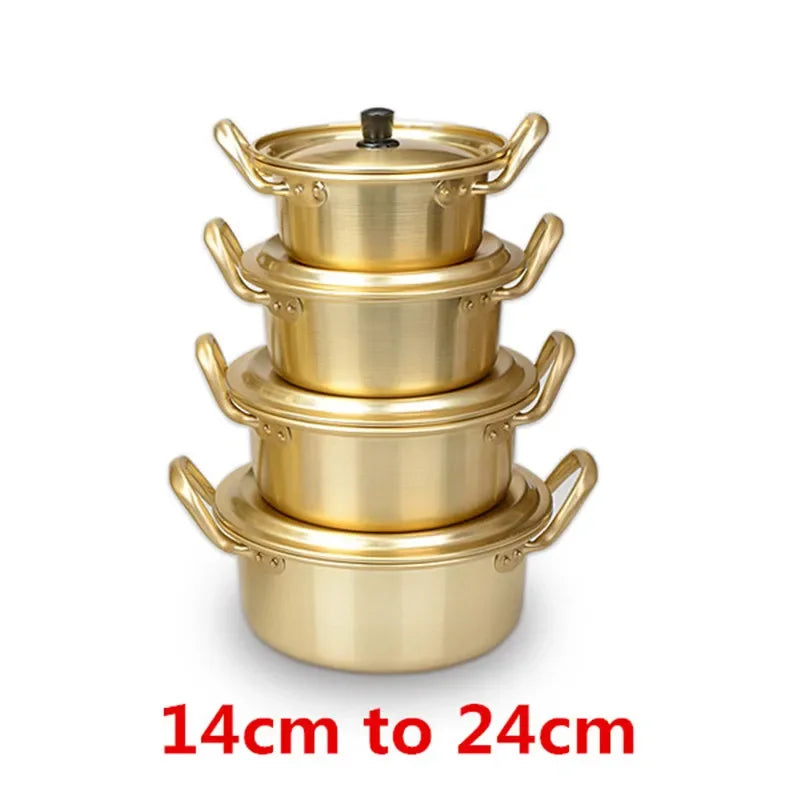 Gold aluminum stock pot by MC THE BLACK DIAMOND, ideal for cooking in kitchen, featuring a sturdy handle and spacious design.
