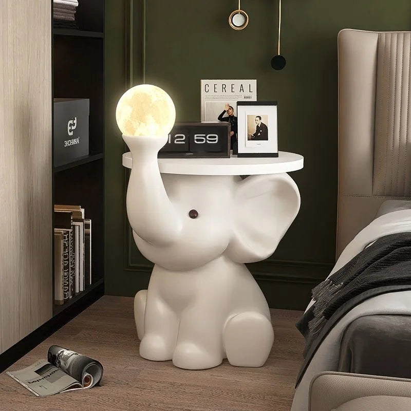Creative elephant statue side table by MC THE BLACK DIAMOND, living room end table featuring a detailed elephant design.