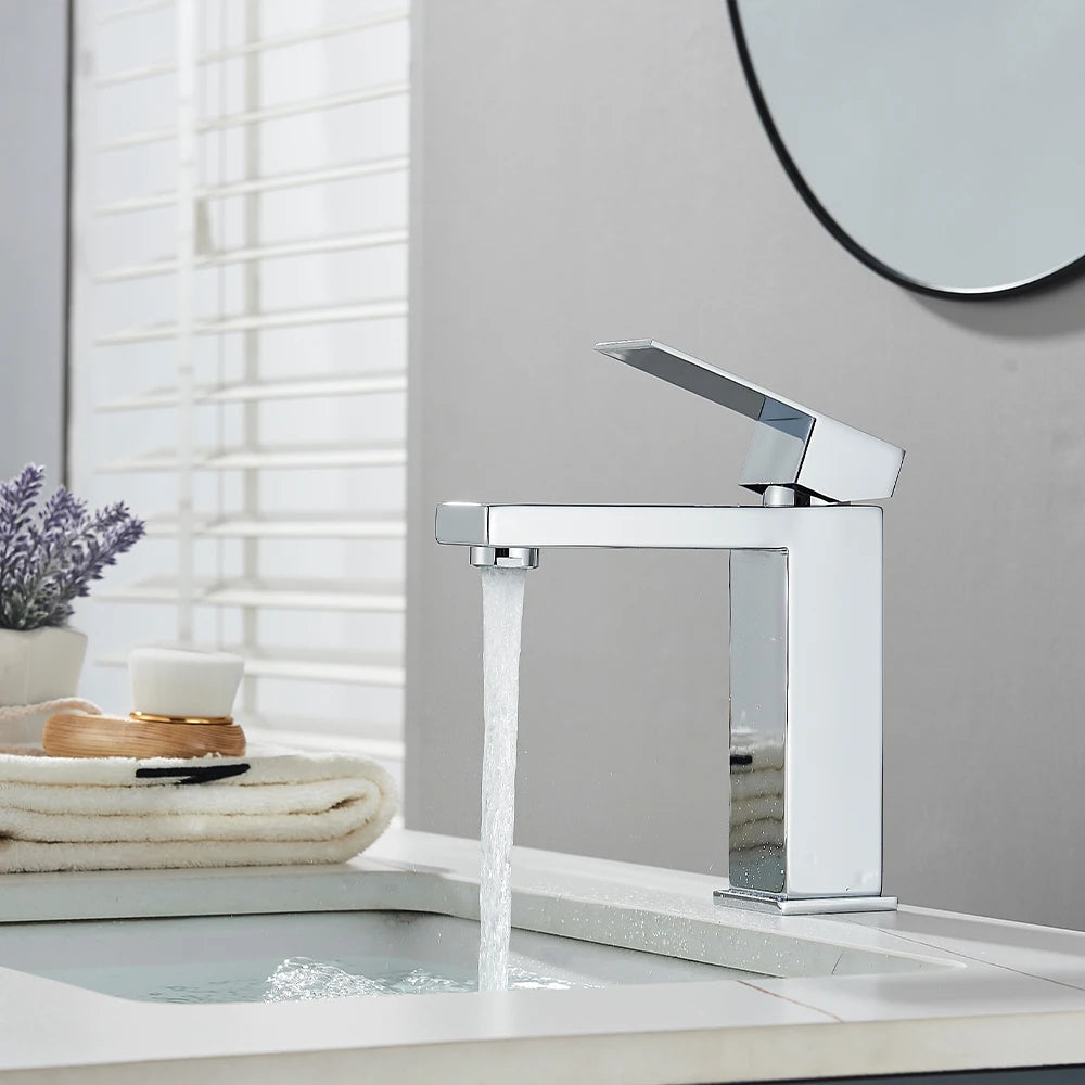 Matte black stainless steel bathroom sink faucet with hot and cold mixer from MC THE BLACK DIAMOND, modern bathroom fixture.
