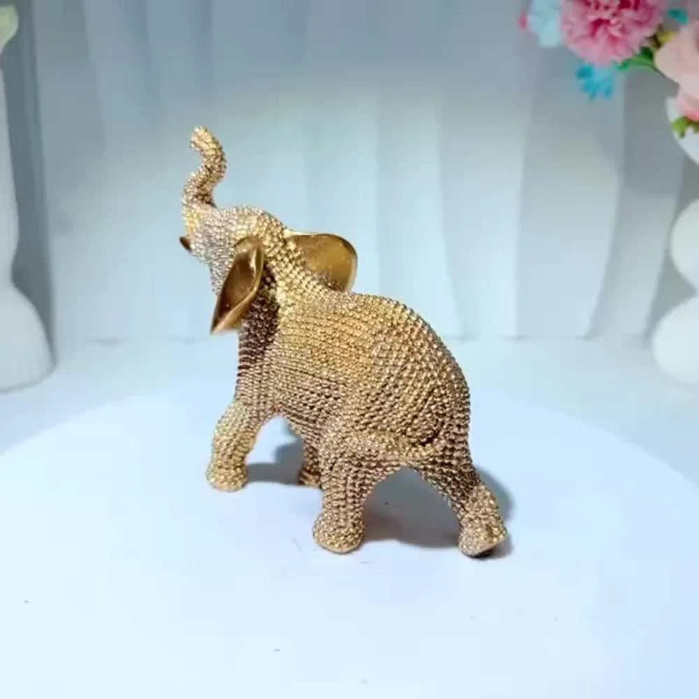 Golden elephant beaded figurine by MC THE BLACK DIAMOND, decorative good luck animal ornament for home decor and holiday decoration.