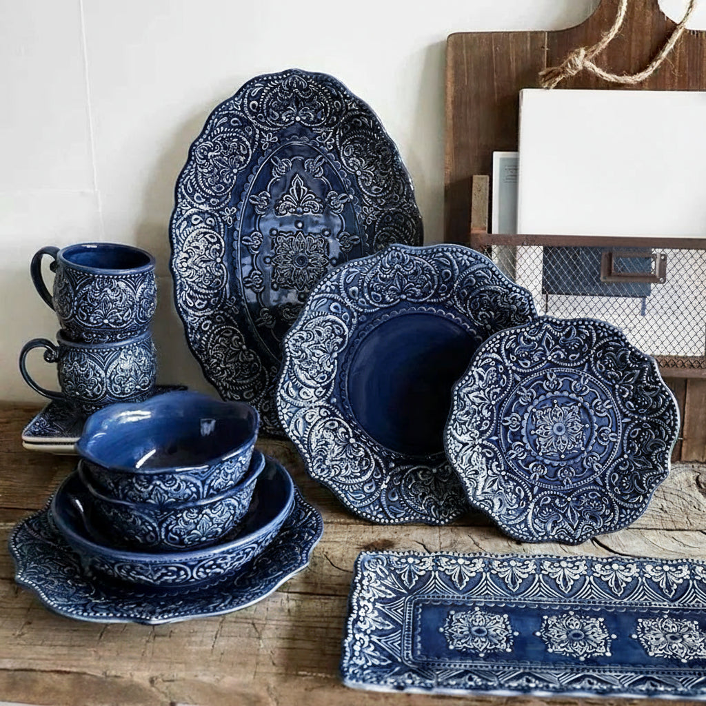 Blue retro relief ceramic dinnerware set by MC THE BLACK DIAMOND, featuring matching dishes with vintage-inspired relief designs.
