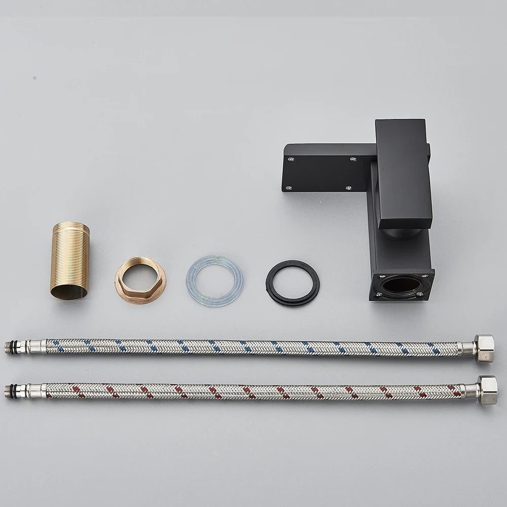 LED bathroom sink faucet by MC THE BLACK DIAMOND, black brass waterfall mixer with hot and cold water controls for modern baths.