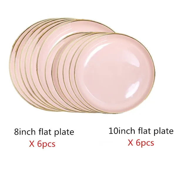 Set of bright white and pink porcelain plates with gold accents by MC THE BLACK DIAMOND, perfect for elegant kitchen table settings.