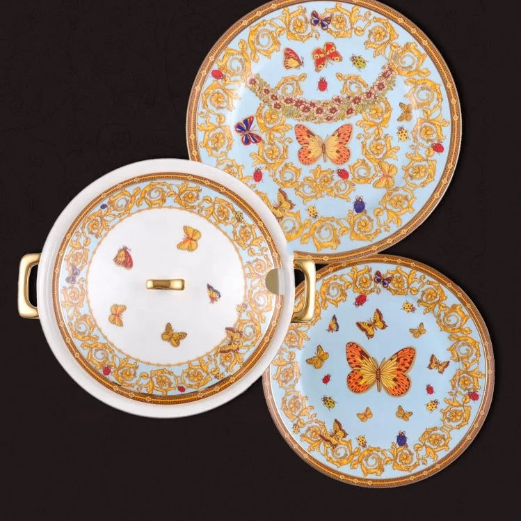 Golden Butterfly dinnerware set by MC THE BLACK DIAMOND, featuring elegant plates and bowls with butterfly designs.