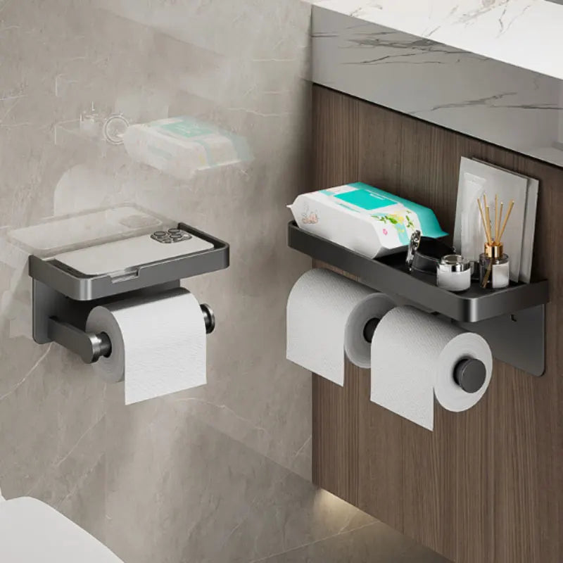MC THE BLACK DIAMOND toilet paper holder from Mainland China, mounted bathroom accessory in a modern bathroom setting.