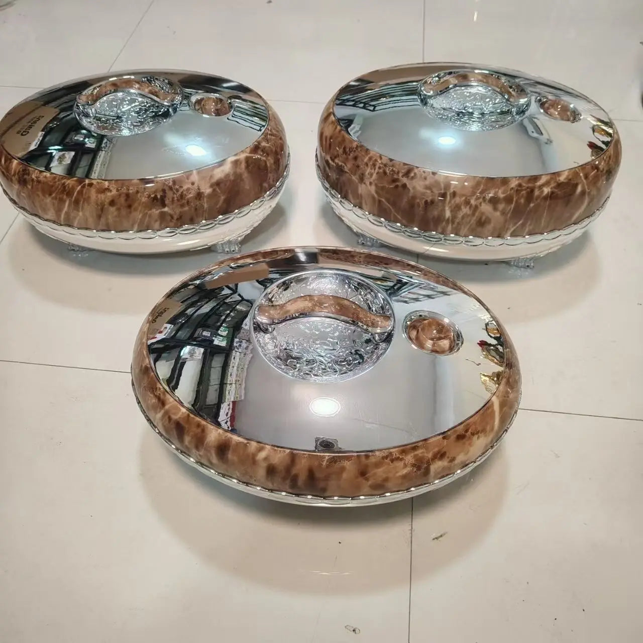 Large MC THE BLACK DIAMOND stainless steel hot pot set for parties, featuring a portable food warmer with multiple compartments.