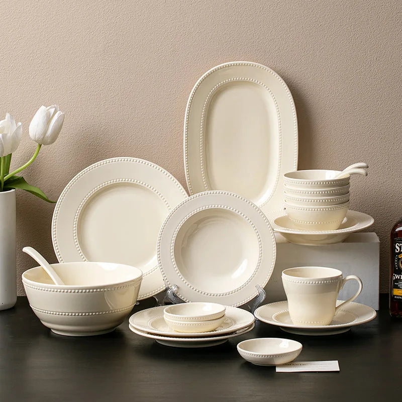 Modern minimalist ceramic round dinnerware set by MC THE BLACK DIAMOND, featuring sleek plates and bowls for stylish table settings.