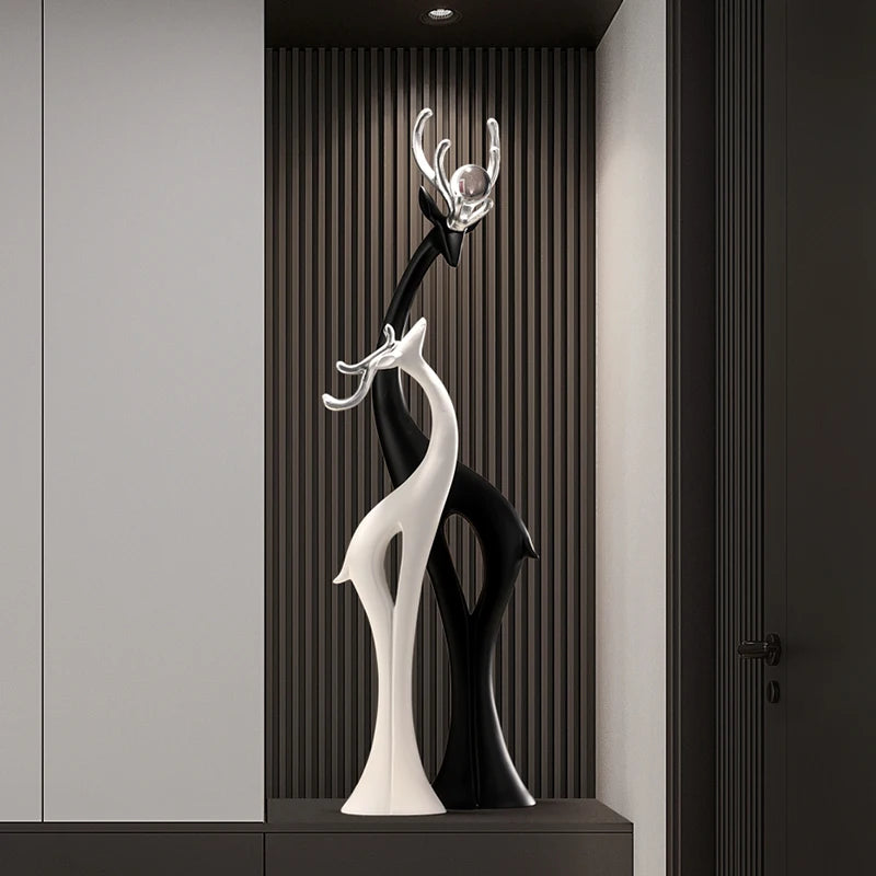 Modern MC THE BLACK DIAMOND couple deer figurine ornament for home decor, stylish addition to living room or entrance decor.