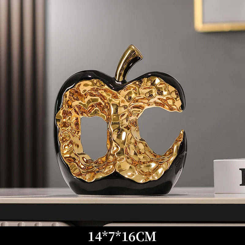 Modern ceramic apple ornament by MC THE BLACK DIAMOND, a sleek light luxury home decor figurine in the shape of an apple.
