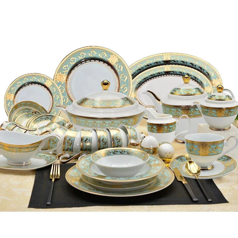 Embossed gold porcelain dinnerware set by MC THE BLACK DIAMOND featuring elegant embossed gold patterns on white porcelain plates and bowls.