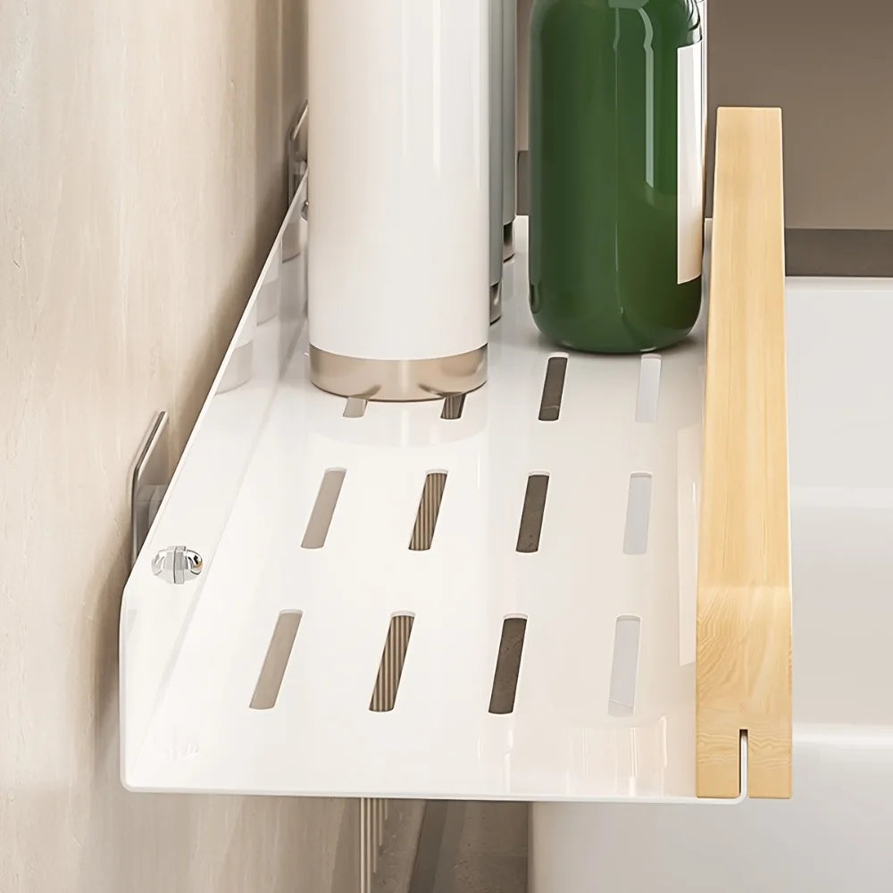 Wall-mounted bathroom storage organizer caddy for shampoo and accessories by MC THE BLACK DIAMOND, with multiple compartments for bathroom use.
