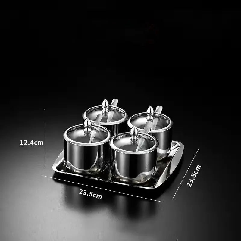 Golden seasoning box with glass cap, spoon, and flavoring tank by MC THE BLACK DIAMOND, ideal for kitchen seasoning storage.