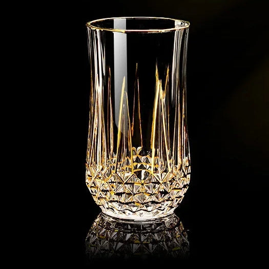 Elegant glass red cup with gold crystal accents from MC THE BLACK DIAMOND drinkware set, showcasing a luxurious design.