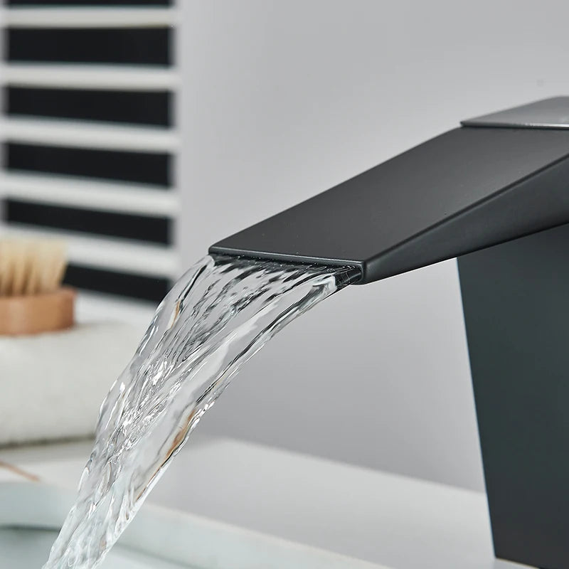 MC THE BLACK DIAMOND LED waterfall bath sink faucet with deck mount mixer, modern design, and sleek chrome finish.