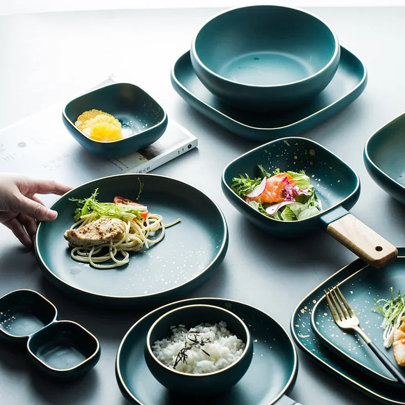 Dark green ceramic Western dinnerware set by MC THE BLACK DIAMOND, includes plates and bowls with a modern Nordic design.