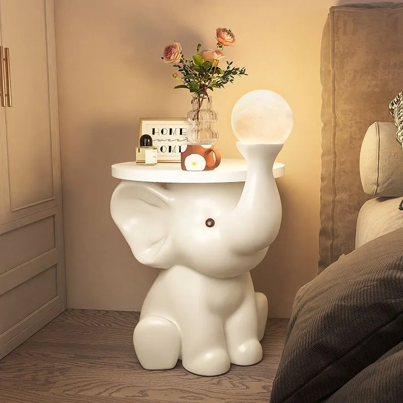 Creative elephant statue side table by MC THE BLACK DIAMOND, living room end table with detailed elephant design.