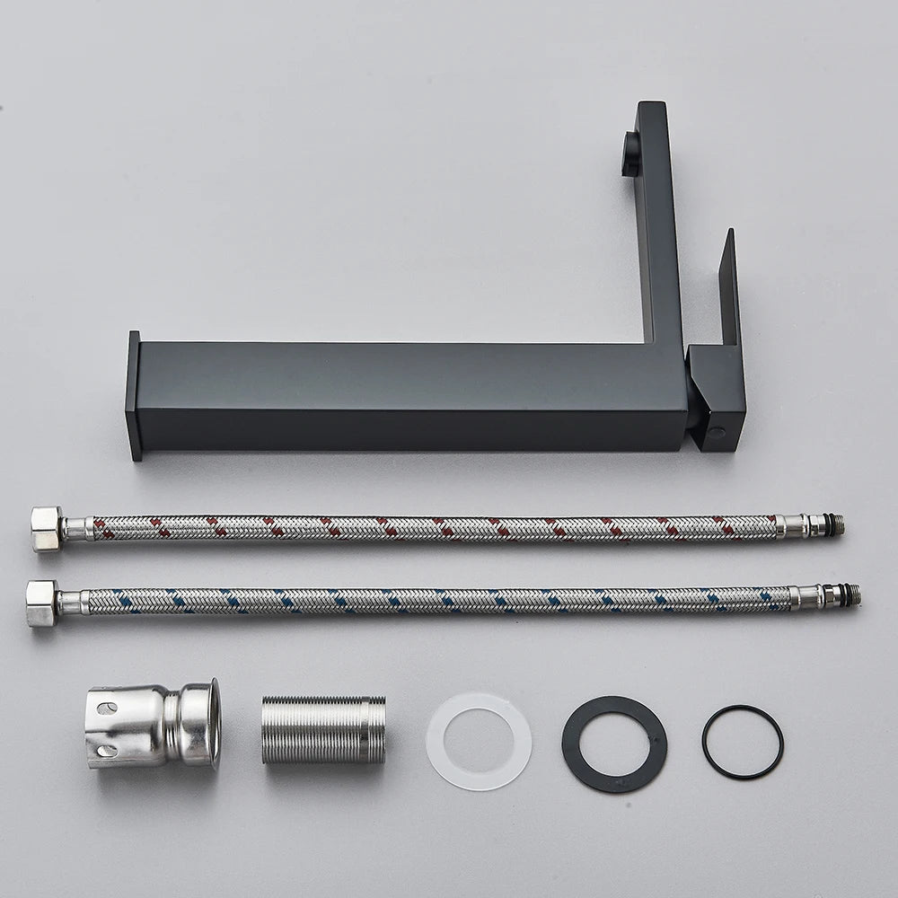 Matte black stainless steel bathroom sink faucet with hot and cold mixer, from MC THE BLACK DIAMOND, for modern bathroom use.