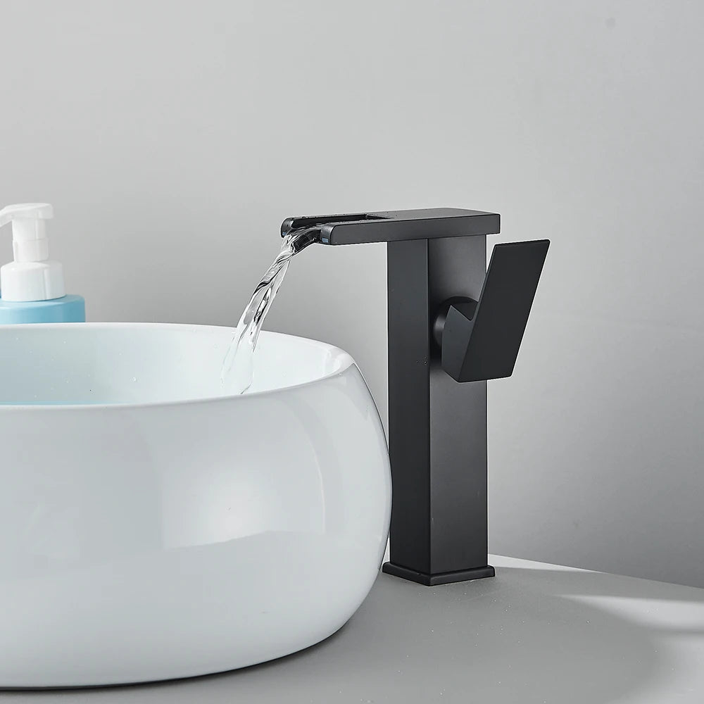 Black LED bathroom sink faucet by MC THE BLACK DIAMOND, brass waterfall design with hot and cold water mixer.