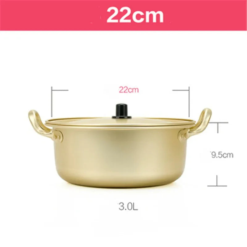 Gold aluminum stock pot from MC THE BLACK DIAMOND, perfect for hot cooking and kitchen use with durable aluminum construction.