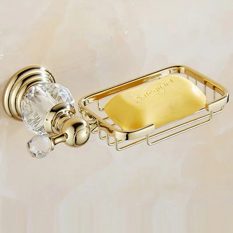 Luxury gold polished brass bathroom accessories set featuring soap dispenser, tumbler, and soap dish from MC THE BLACK DIAMOND.
