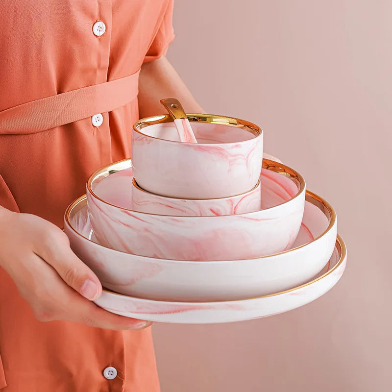 Pink gilded marble pattern porcelain dinnerware set by MC THE BLACK DIAMOND, featuring elegant plates and bowls for stylish table setting.