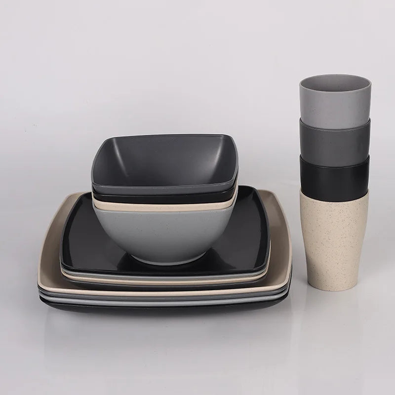 Set of 16/32 plastic square dinnerware pieces from MC The Black Diamonds, dishwasher safe, includes plates and bowls in black color.