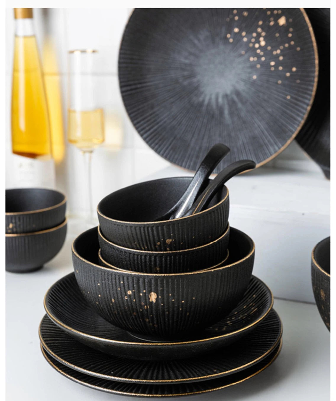 Luxury golden and black dinnerware set by MC THE BLACK DIAMOND, featuring elegant plates and bowls for sophisticated table settings.