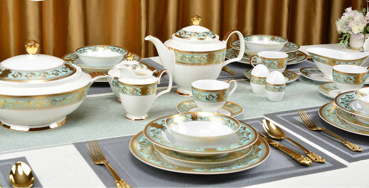 Embossed gold porcelain dinnerware set by MC THE BLACK DIAMOND with luxurious design and intricate details.