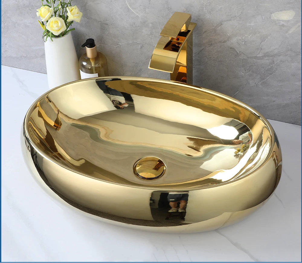 Gold MC THE BLACK DIAMOND waterfall vessel sink and faucet set, modern bathroom fixture with sleek design and shiny finish.