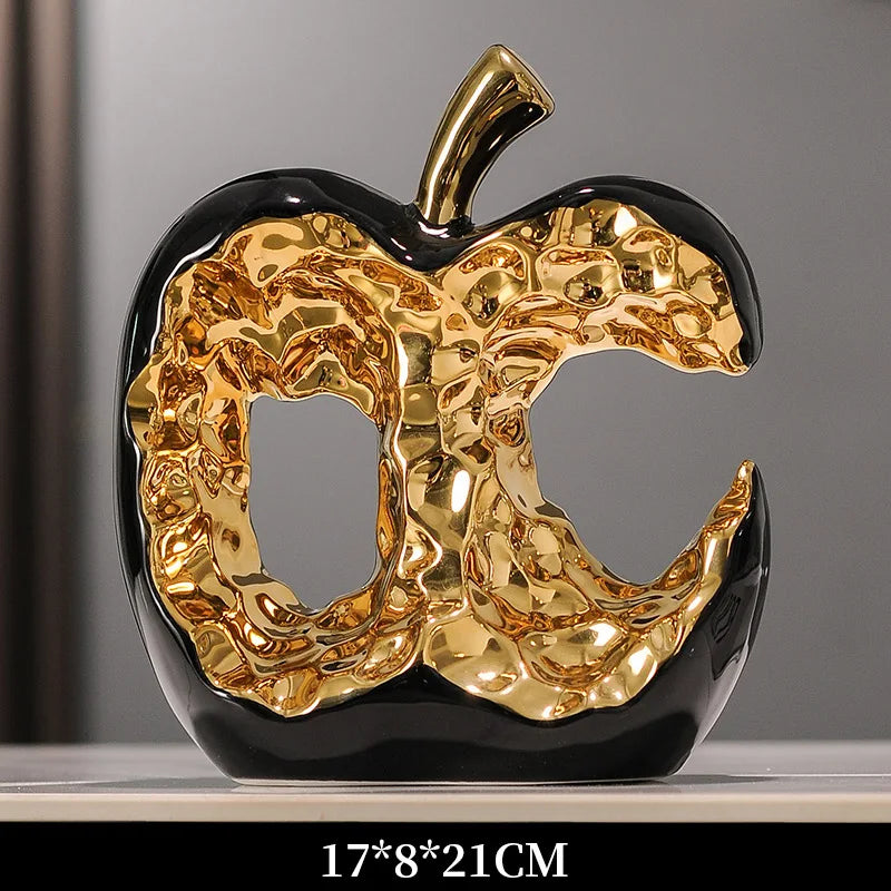 Modern ceramic apple ornament by MC THE BLACK DIAMOND, light luxury home decor figurine with sleek, contemporary design.