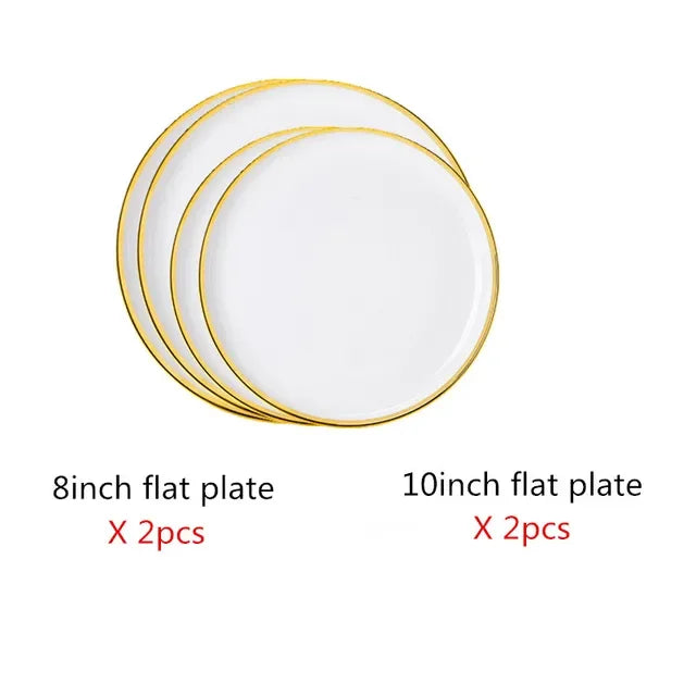Set of bright white and pink porcelain plates with gold accents from MC THE BLACK DIAMOND, ideal for elegant kitchen table settings.