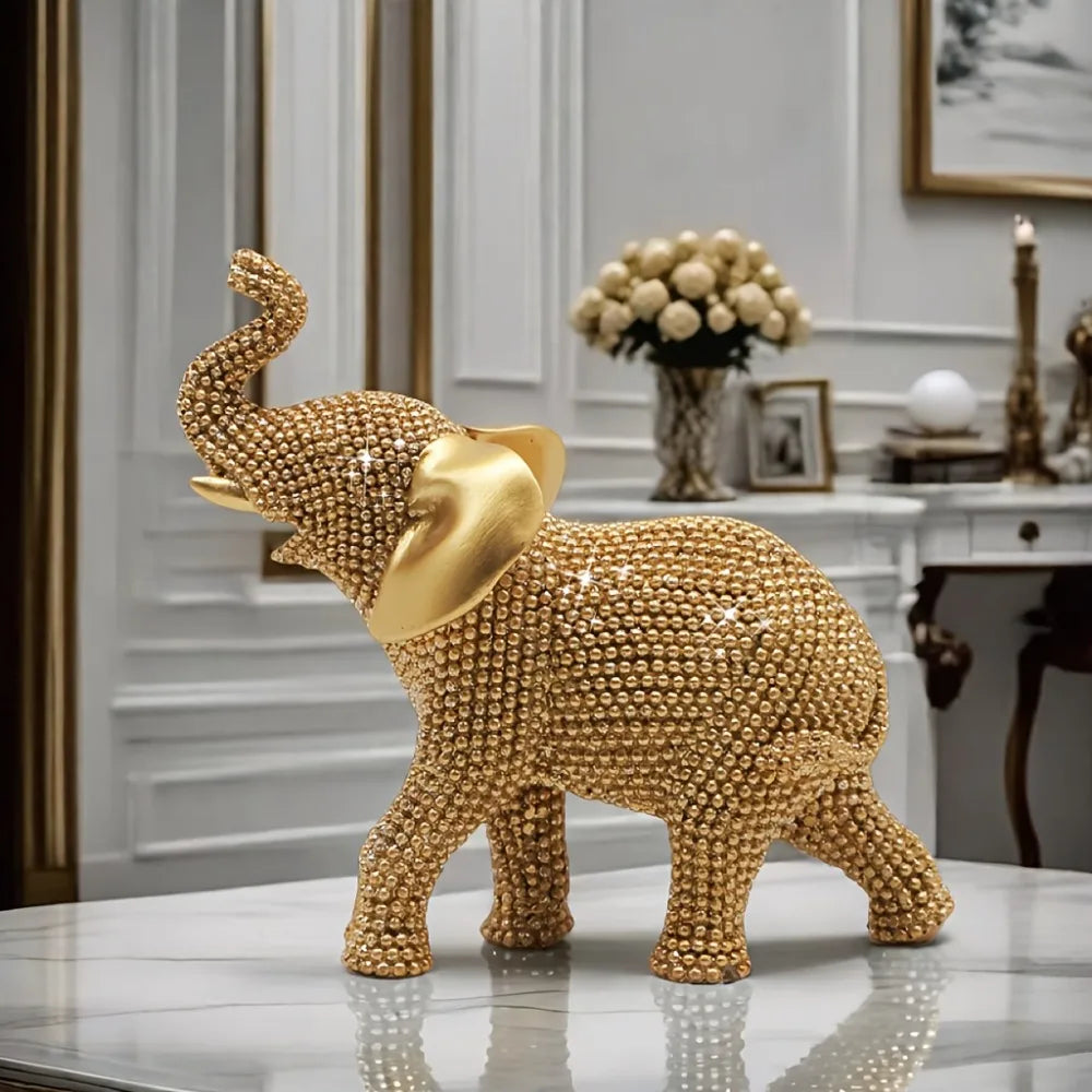 Golden elephant beaded figurine by MC THE BLACK DIAMOND, decorative good luck ornament for home decor and holiday decoration.