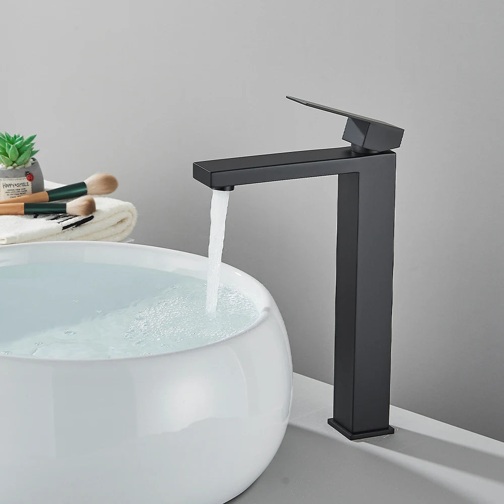 Matte black stainless steel bathroom sink faucet with hot and cold mixer, modern design from MC THE BLACK DIAMOND.
