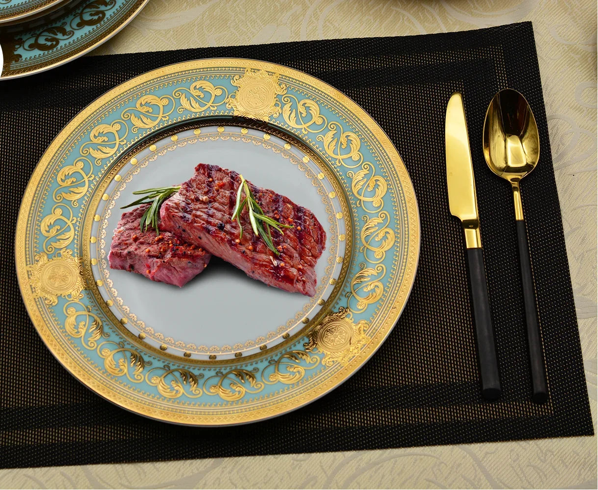 Embossed gold porcelain dinnerware set by MC THE BLACK DIAMOND featuring elegant design and luxurious finish.