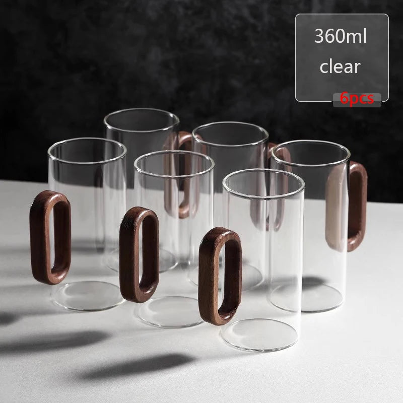 MC The Black Diamond glass mug with wooden handle, part of a drinkware set, featuring a clear glass design and natural wooden grip.