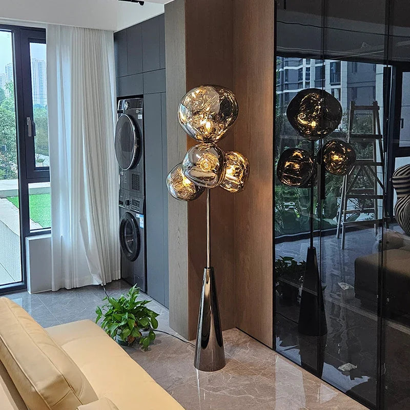 Luxury-simplified MC THE BLACK DIAMOND floor lamp with sleek modern design and a tall, elegant standing structure in a well-lit room.